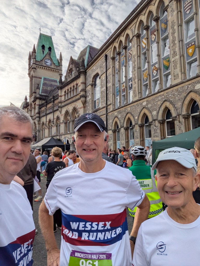 Three WRR runners in front of the Winchester Guildhall